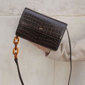 JW PEI Maroon mini crossbody bag.